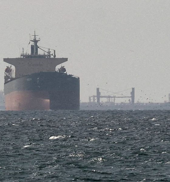 Cargo ships in the Gulf, near the Strait of Hormuz in March. Pic: Reuters