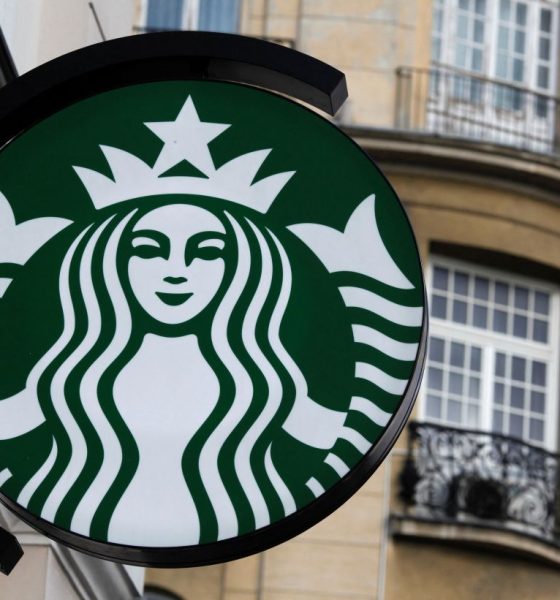 The Starbucks logo is seen outside the new Starbucks cafe in Warsaw