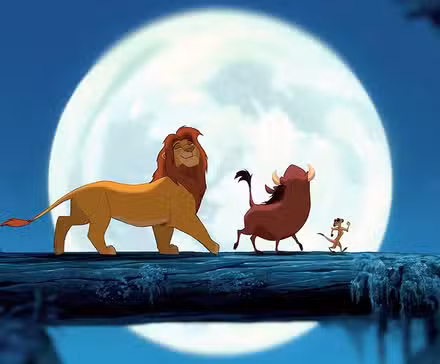 Timon Pumba and Simba walking across a log in the moonlight in The Lion King.