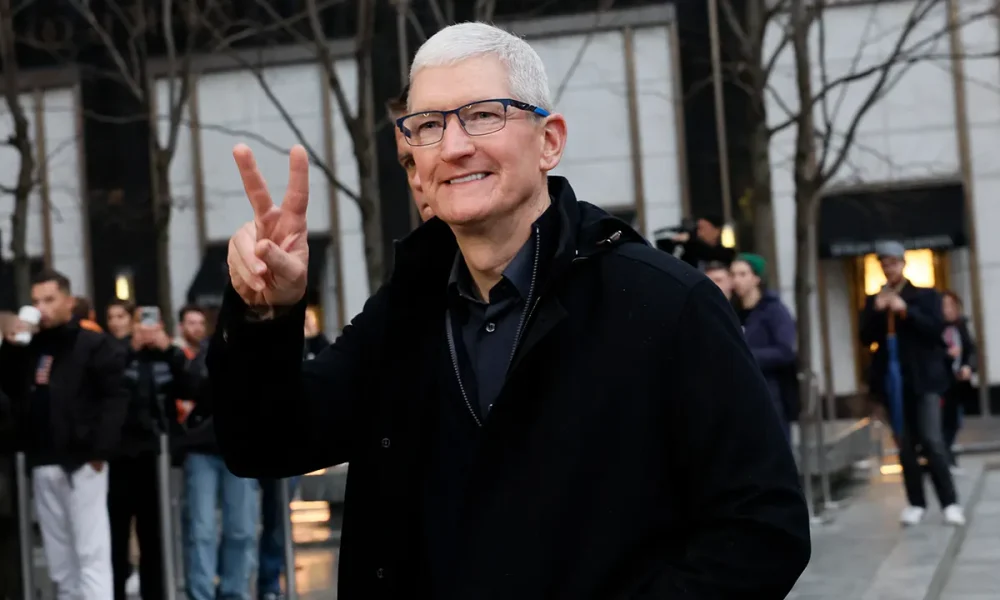 Apple shakeup sparks reactions as Cook hands reins to longtime deputy