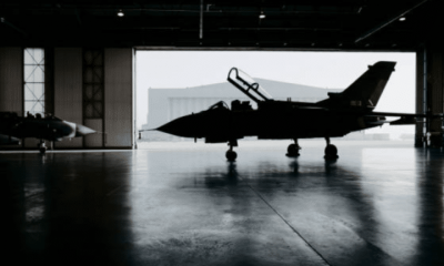 Military spending - an aircraft is stationary in an airplane hangar