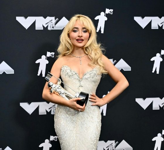 US singer Sabrina Carpenter poses in the pressroom with the VMA for Song of the Year for "Espresso"
