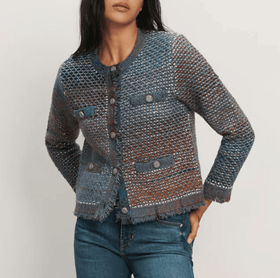 woman wears knit jacket that looks like tweed with an interesting blue and brown color scheme