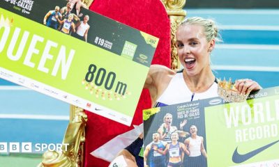 Keely Hodgkinson poses on a throne after breaking the world indoor 800m record