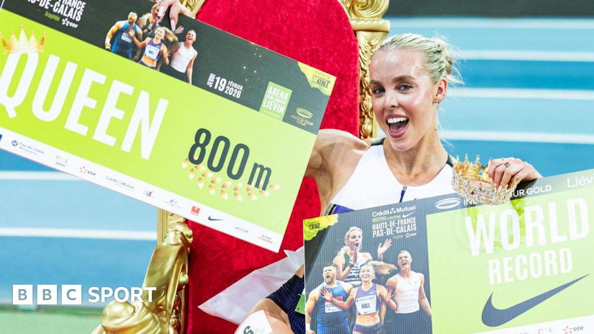 Keely Hodgkinson poses on a throne after breaking the world indoor 800m record