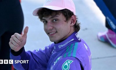 Mercedes' Kimi Antoenlli looks back, smiles and gives the thumbs-up signal after taking pole position for the Miami Grand Prix