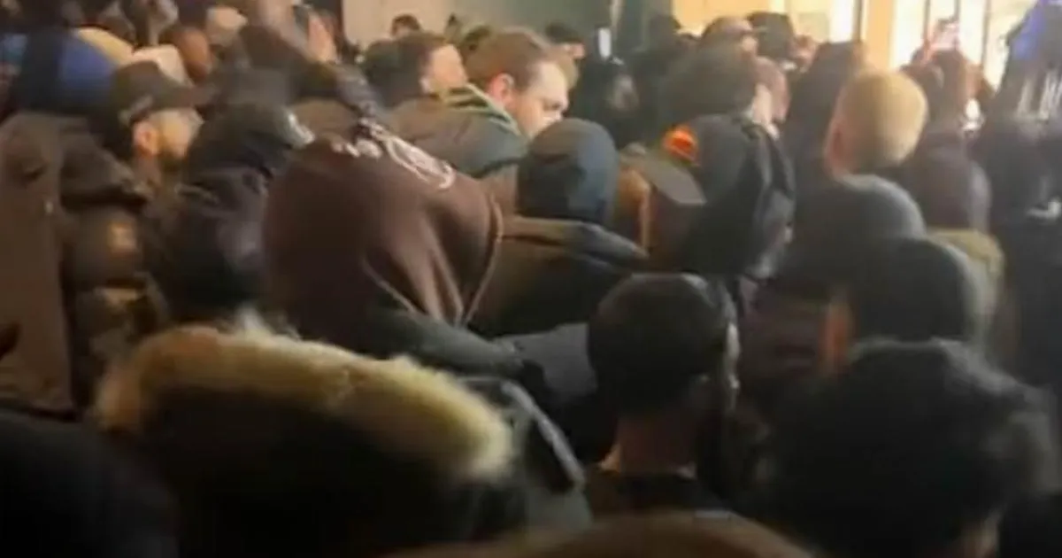 Crowds queue all night for Swatch launch only to see mob swarm in and ruin it