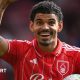 Morgan Gibbs-White celebrates scoring a hat-trick against Burnley