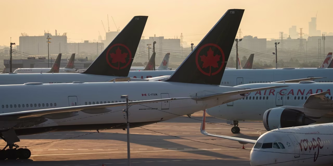 Air Canada Swings to First-Quarter Profit, Suspends Full-Year Guidance