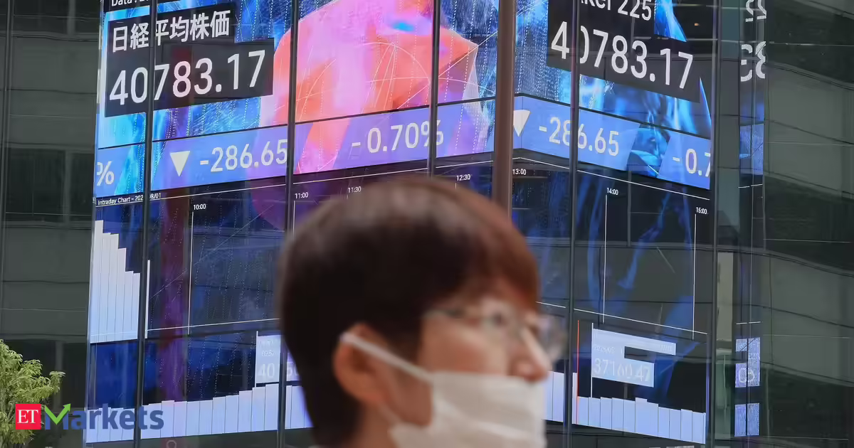 Japan's Nikkei hits record high as chip-related shares jump