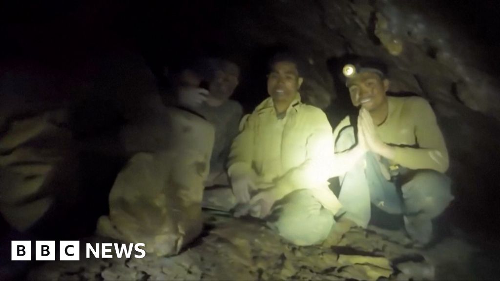 Moment rescuers find five men trapped in Laos cave