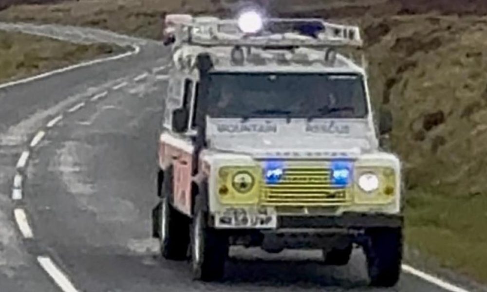 Emergency services rescuing dog in hole at Botton Village