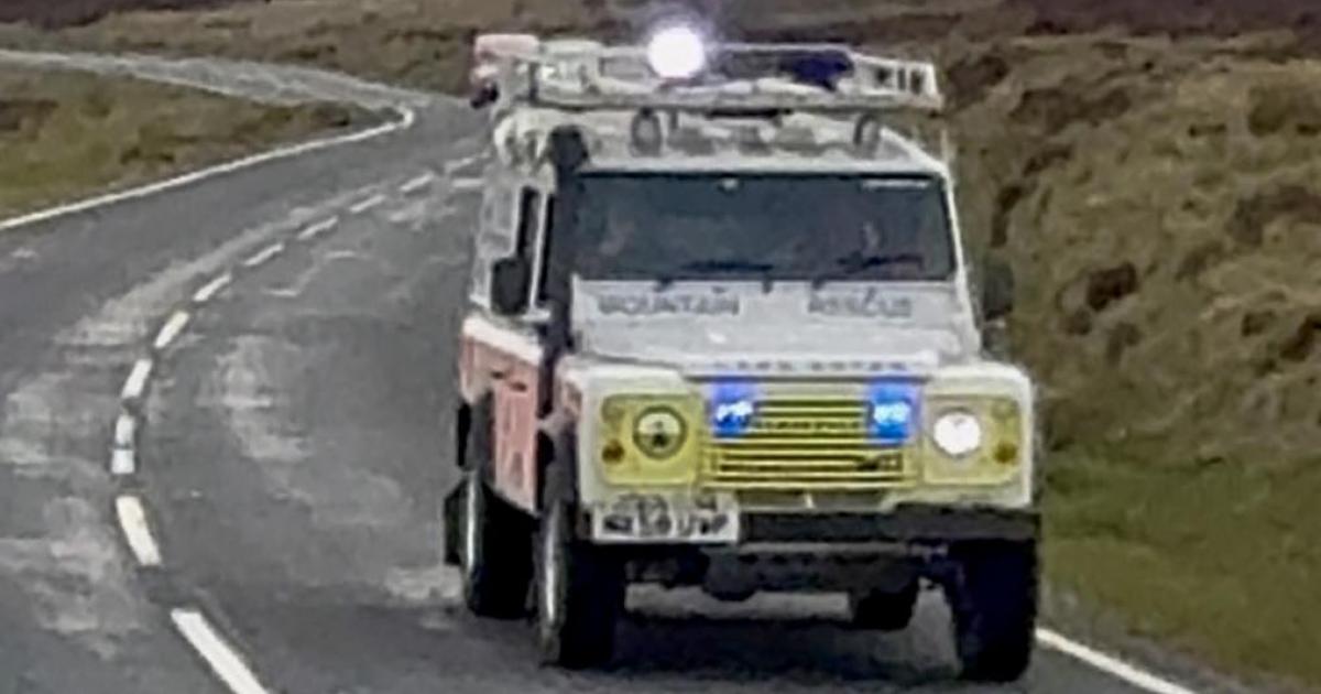 Emergency services rescuing dog in hole at Botton Village