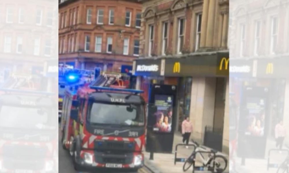 Rooftop rescue in Bolton town centre by firefighters