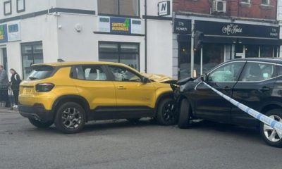 Two-car crash sees police close major junction in Horwich