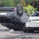 Three-car crash closes Halliwell road with one car on its roof