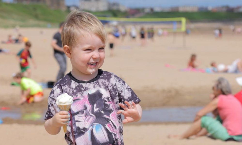 People soak up the sun at Tynemouth and Cullercoats beaches