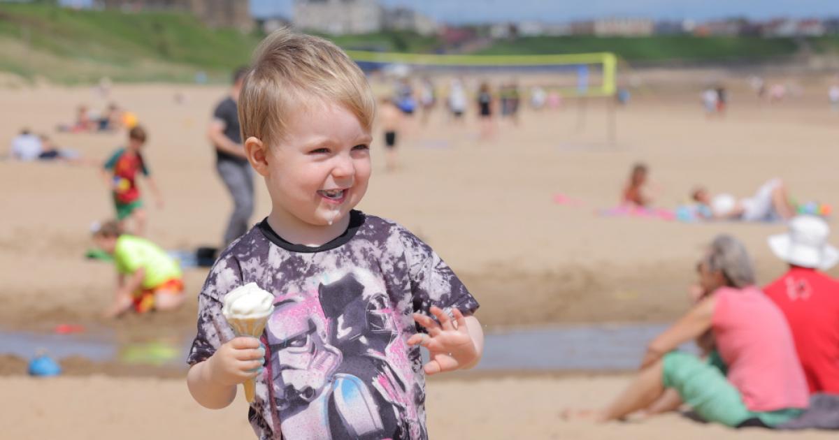 People soak up the sun at Tynemouth and Cullercoats beaches