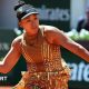 Naomi Osaka wears a gold sequined dress in the first round at the French Open