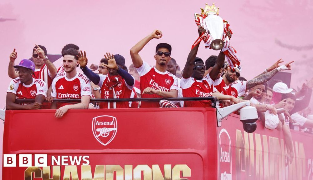 Arsenal fans line London streets in Premier League victory parade
