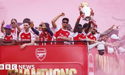 Arsenal fans line London streets in Premier League victory parade