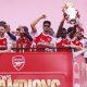 Arsenal fans line London streets in Premier League victory parade