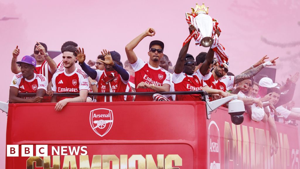 Arsenal fans line London streets in Premier League victory parade