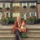 Graham Norton cosies up to a gnome on the set of his new series The Neighbourhood