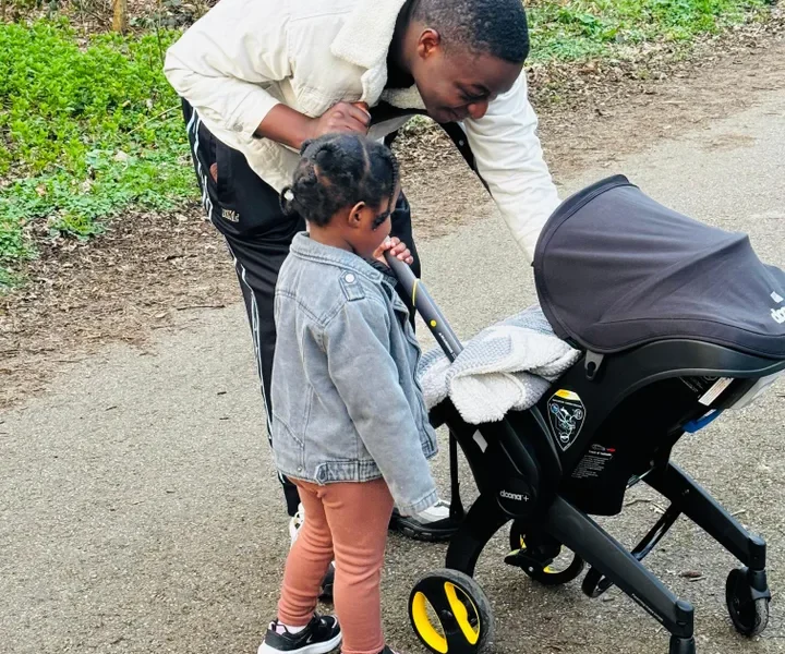 Ron Mutira and his children