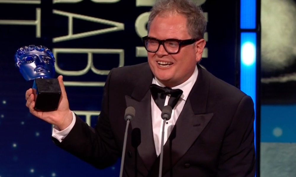 Alan Carr Shouts Out 'Thick' Celebrity Traitors At TV Baftas