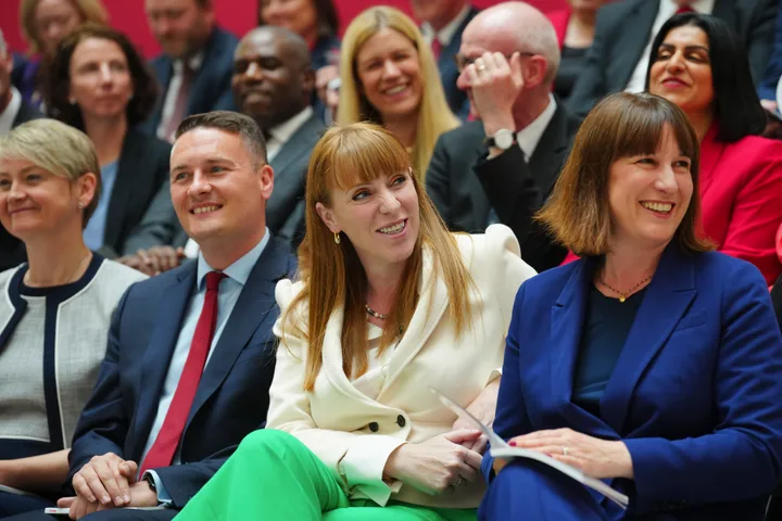 Britain's Rachel Reeves, Shadow Chancellor of the Exchequer, right, Angela Rayner Deputy Leader of the Labour Party, second right, Wes Streeting, Shadow Secretary of State for Health and Social Care, second left, and Yvette Cooper, Shadow Secretary of State for the Home Department at the launch of The Labour party's 2024 general election manifesto in Manchester, England, Thursday, June 13, 2024.