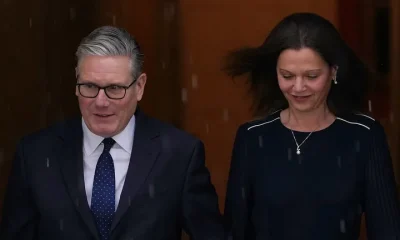 Britain's Prime Minister Keir Starmer and wife Victoria leave 10 Downing Street to attend the State Opening of Parliament at the Houses of Parliament in London, Wednesday, May 13, 2026.