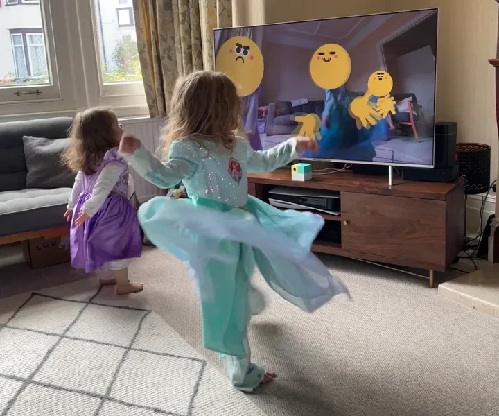Kids using the emoji feature on Mirrorama – they created their own game of trying to steal the 'smiley' face from each other.
