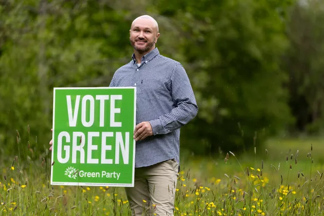 Former Green Party Candidate Chris Kennedy poses for a portrait at Low Hall Nature Reserve on May 21, 2026 in Wigan, England.