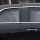 President Donald Trump sits at the back of the presidential limousine as it drives outside the Walter Reed National Military Medical Center from the White House on May 15, in Bethesda, Maryland.