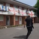 View at flats decorated with the St George's Cross flag in Ashton-in-Makerfield where Andy Burnham will stand as Labour's candidate for the by-election in Makerfield, England, Friday, May 22, 2026.