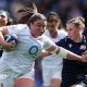 Maud Muir carries the ball