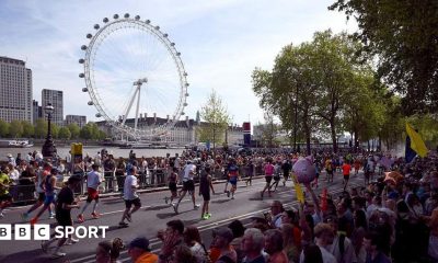 London Marathon runners with the London Eye in the background