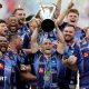 Maxime Lucu lifts the Investec Champions Cup trophy