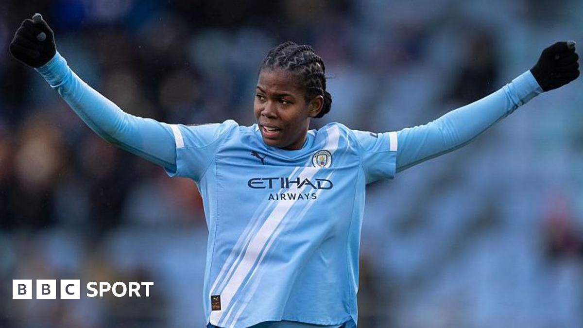 Khadija Shaw celebrates during a Manchester City game
