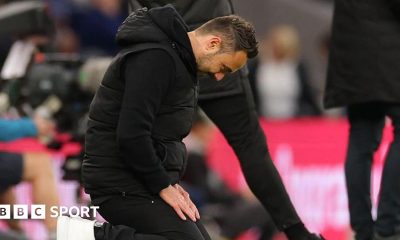 Roberto De Zerbi slumps to his knees during Tottenham Hotspur's draw at home to Leeds United.