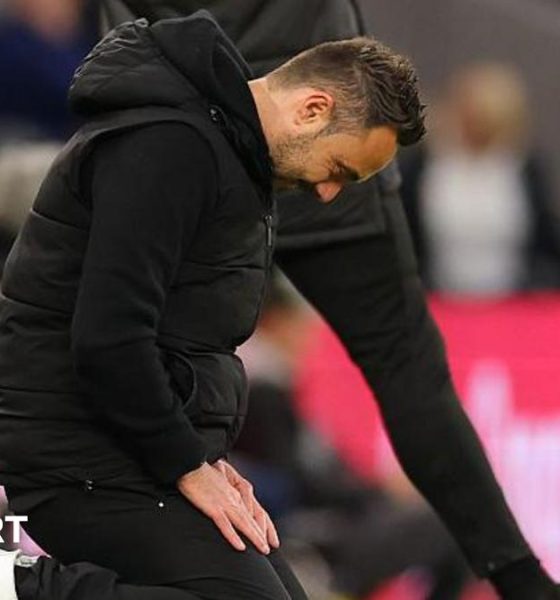 Roberto De Zerbi slumps to his knees during Tottenham Hotspur's draw at home to Leeds United.
