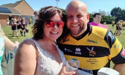 Rugby-loving bride cheers husband on in wedding dress | News Weird