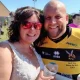 Rugby-loving bride cheers husband on in wedding dress | News Weird