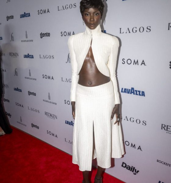 Anok Yai in a white two-piece