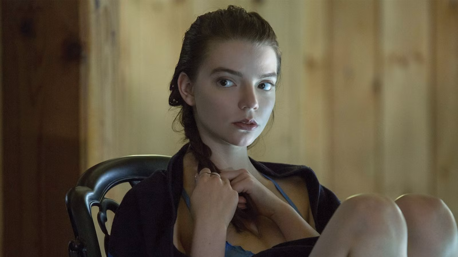 Anya Taylor-Joy as Lily sitting wrapped in a towel in the film Thoroughbreds.