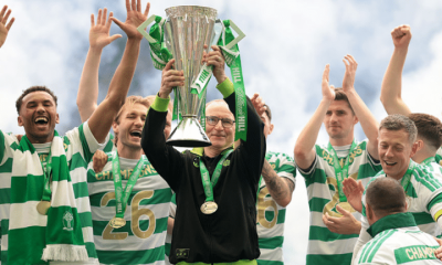 Martin O'Neill, Interim Manager of Celtic lifts the William Hill Premiership trophy with players of Celtic following the team's victory in the William Hill Premiership match between Celtic and Heart of Midlothian at Celtic Park on May 16, 2026 in Glasgow, Scotland.