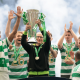 Martin O'Neill, Interim Manager of Celtic lifts the William Hill Premiership trophy with players of Celtic following the team's victory in the William Hill Premiership match between Celtic and Heart of Midlothian at Celtic Park on May 16, 2026 in Glasgow, Scotland.