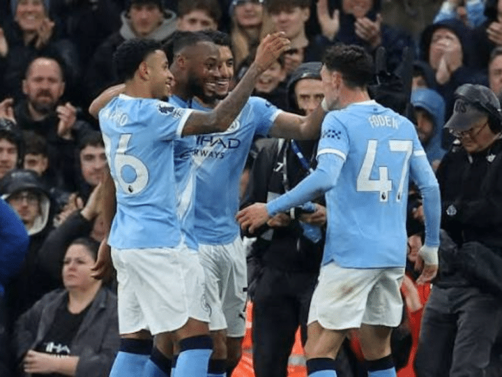 Semenyo, Marmoush and Foden celebrate a goal for City