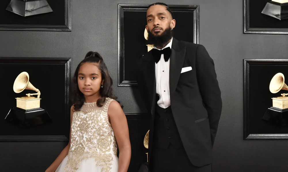 Congratulations! Nipsey Hussle's Daughter Emani Celebrates Major Milestone Surrounded By Family (PHOTO)